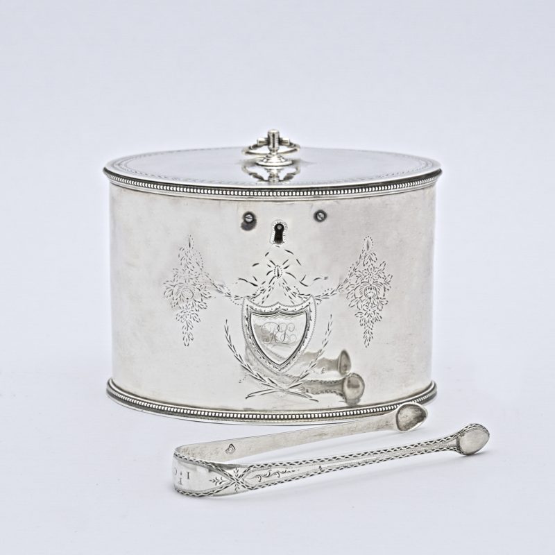 Silver tea caddy and tongs by Van Voorhis and Schenk