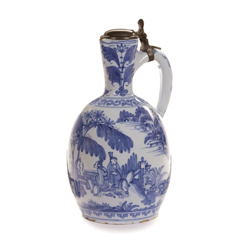 Delftware jug with pewter cover