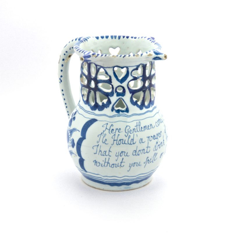 Photo of an 18th century English ceramic puzzle jug